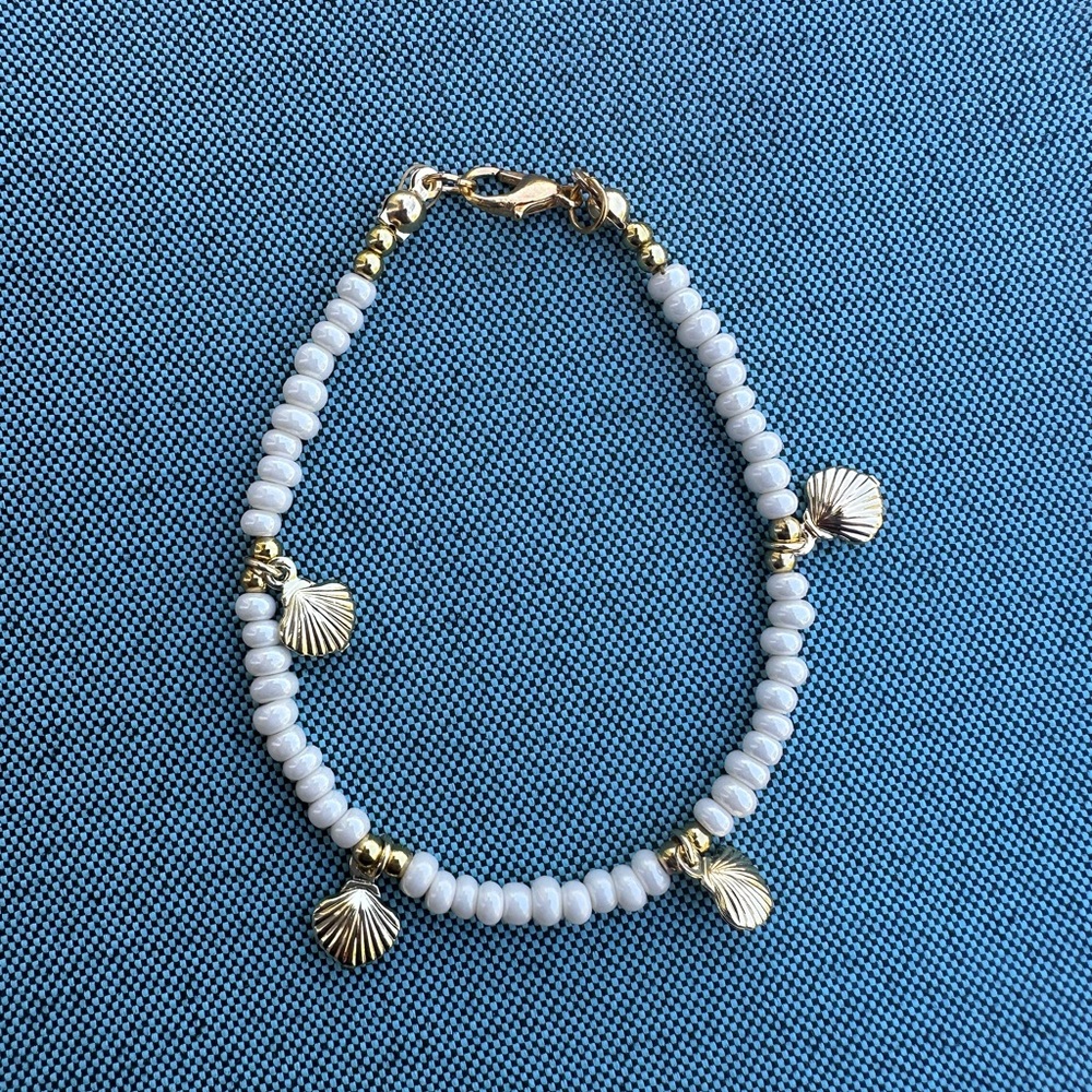 Gold and White Shell Charm Bracelet